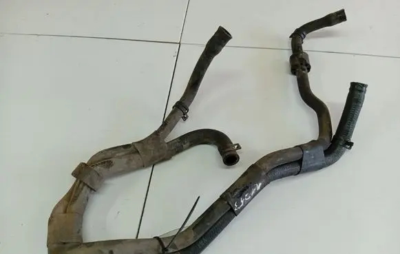 Volkswagen Golf IV Engine coolant pipe/hose 