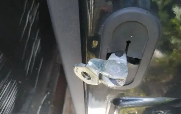 Rear door check strap stopper