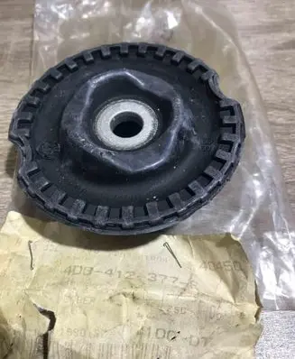 Volkswagen PASSAT B5 Coil spring mount 4D0412377F
