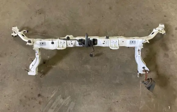Top upper radiator support slam panel