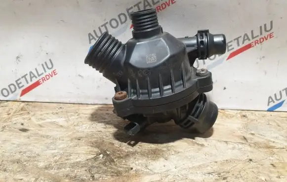 Thermostat/thermostat housing