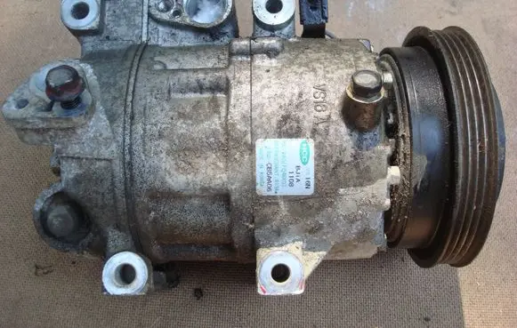 Hyundai Accent Air conditioning (A/C) compressor (pump) 977011E000 F500CB5AA06 CB5AA06