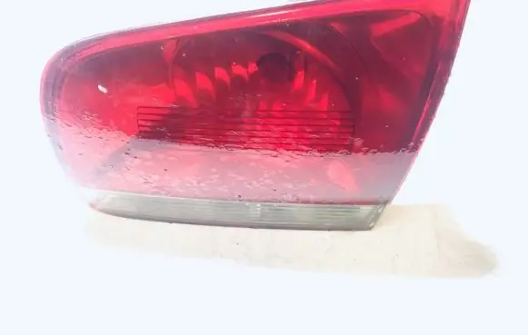 Volkswagen Touareg I Tailgate rear/tail lights 7l6945094h 03090301
