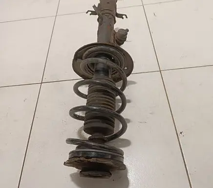 Nissan Juke I F15 Front shock absorber with coil spring 54035JD00A