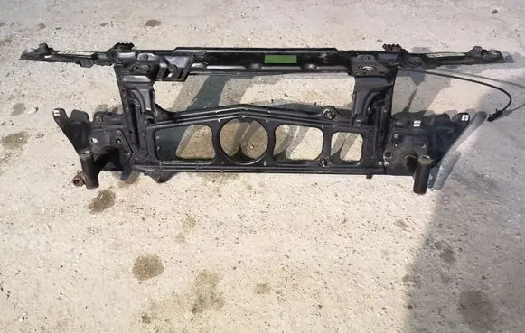 Radiator support slam panel