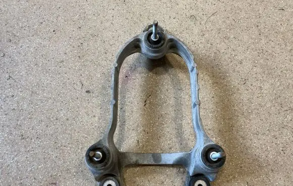 Hyundai Ioniq 5 A/C compressor mount bracket 97703GI000