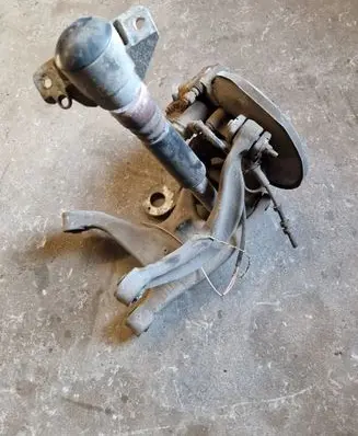 Rear wheel hub spindle/knuckle