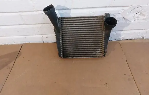 Volkswagen Touareg I Intercooler radiator 7L6145803C