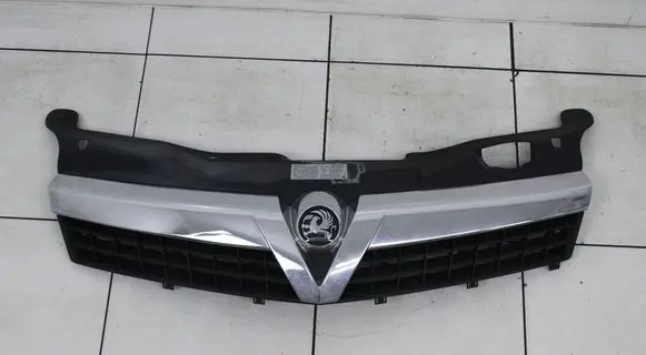 Opel Astra H Front bumper upper radiator grill 13247081