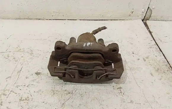 Volkswagen Touran I Front brake caliper