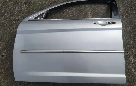 Chrysler Sebring (ST-22 - JR) Front door pilkos