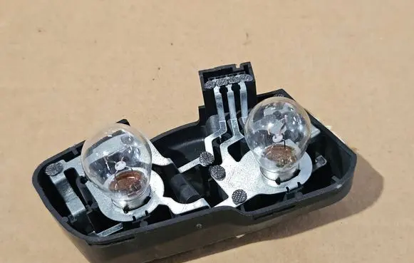 BMW 3 E46 Tail light bulb cover holder 6907938 060555 122320