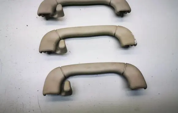 Saab 9-5 A set of handles for the ceiling 90459155 2020496