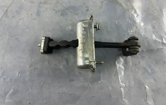 Opel Corsa D Front door check strap stopper 13242975