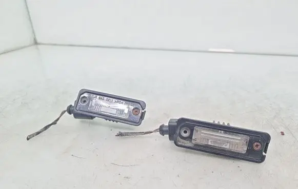 Volkswagen Golf V Number plate light 1J6943021B