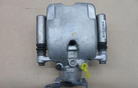 Opel Astra L Front brake caliper 39035603