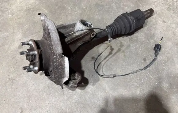 Front wheel hub spindle knuckle