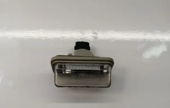 Toyota Avensis T250 Number plate light 8127005042