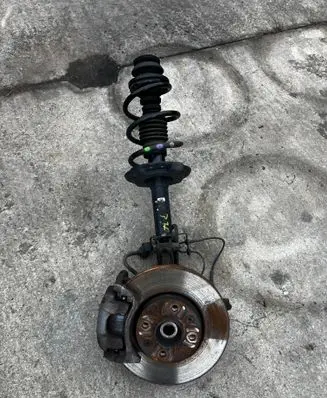 Dacia Sandero III Front shock absorber with coil spring 543028508R