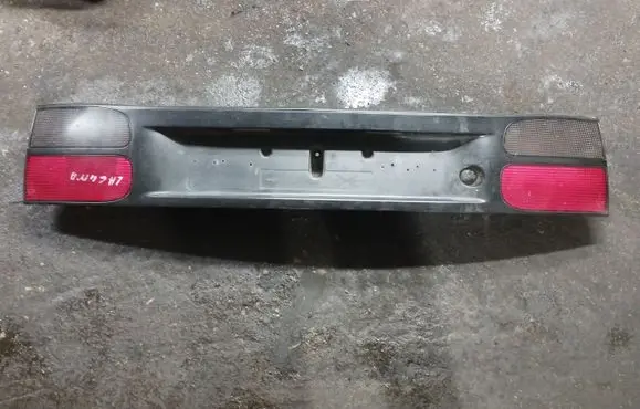 Renault Laguna I Trunk door license plate light bar 7700820049