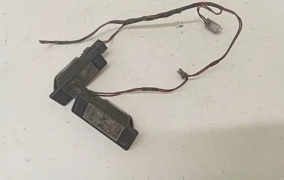 Nissan Primera Number plate light 2KA008224