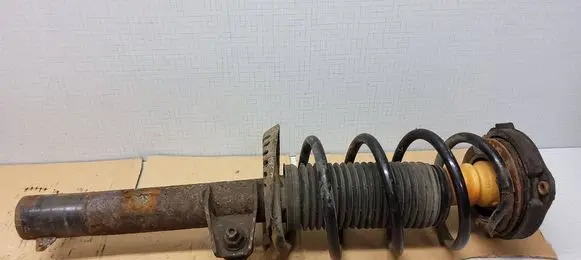 Skoda Octavia Mk2 (1Z) Front shock absorber with coil spring 1K0412303B 1K0412331C