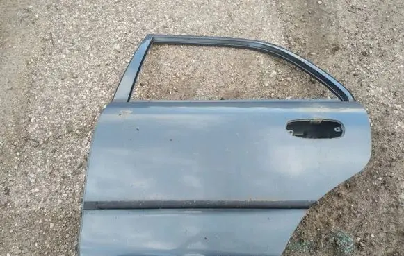 Mitsubishi Carisma Rear door melynos