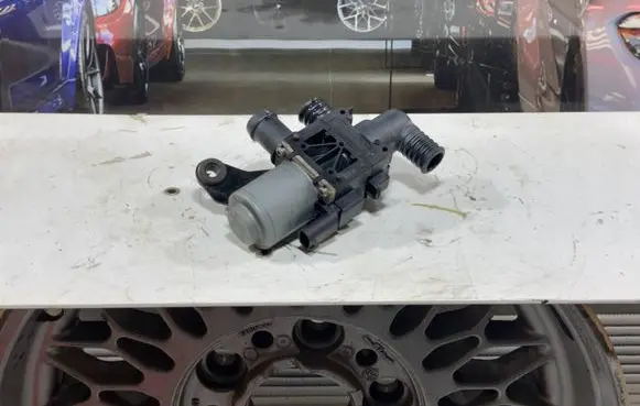 Coolant heater control valve