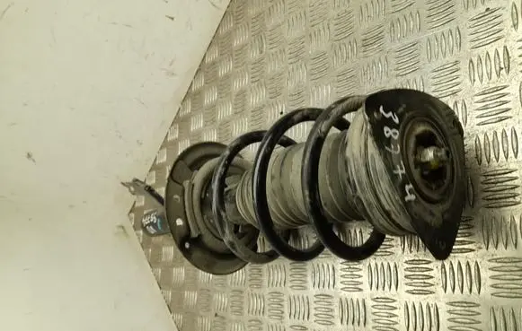 Nissan Ariya Front shock absorber with coil spring 543035MS1C