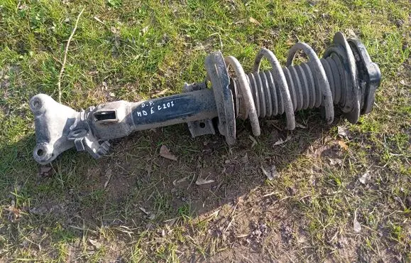 Mercedes-Benz E C207 W207 Front shock absorber with coil spring A2073207238