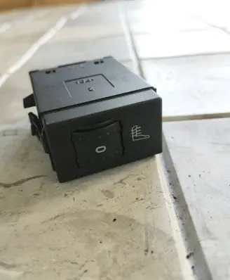 Seat heating switch