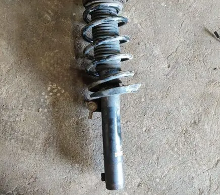 Volkswagen PASSAT B6 Front shock absorber with coil spring