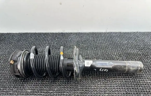 Volkswagen Caddy Front shock absorber with coil spring 5R3412021