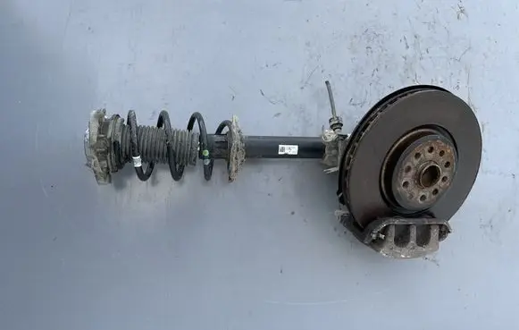 Front wheel hub spindle knuckle