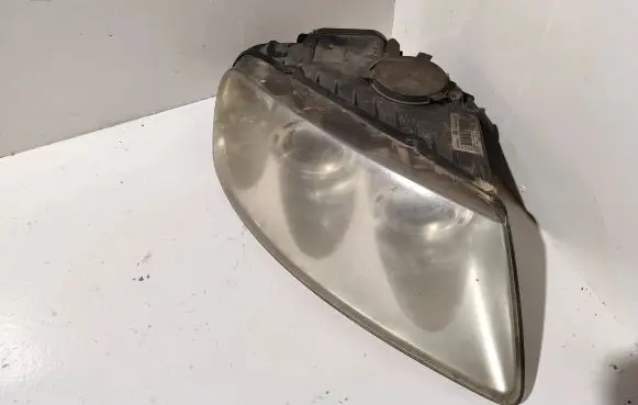 Volkswagen Touareg I Headlight/headlamp 7L6941016BK 89307861