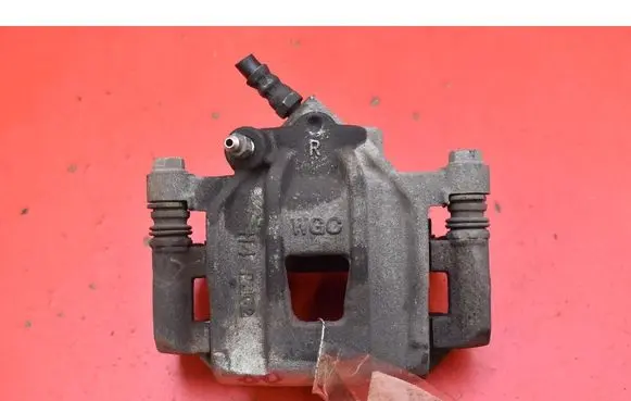 Dacia Spring Front brake caliper 