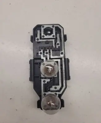 Tail light bulb cover holder