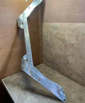 Top upper radiator support slam panel