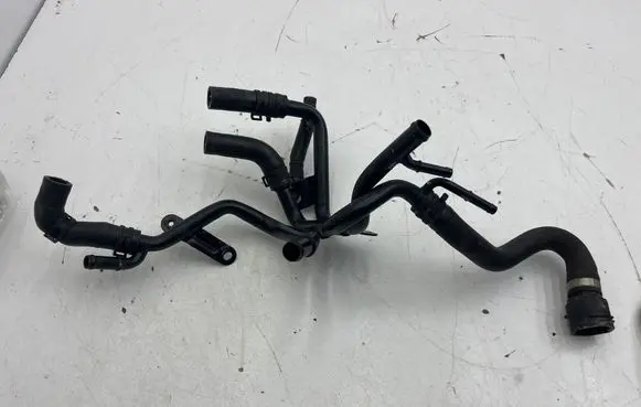 Audi Q2 - Engine coolant pipe/hose 04L121064AE