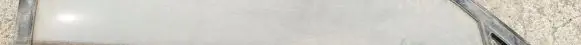 Mazda 323 Front door glass trim molding 