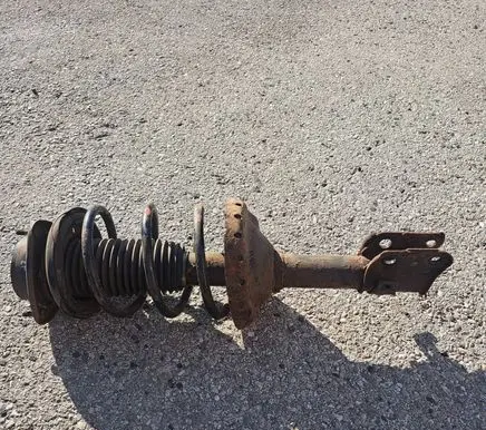 Subaru Forester SG Front shock absorber with coil spring