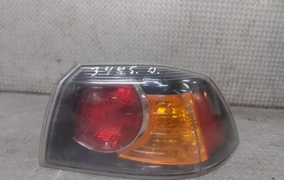 Mitsubishi Lancer VIII Rear/tail lights P5613 P5996