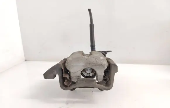 Volkswagen Caddy Rear brake caliper 1234603 8610