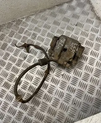 Suzuki Grand Vitara I Front brake caliper