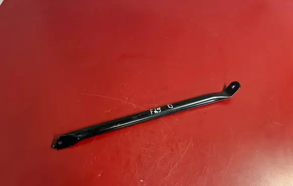 Radiator support slam panel bracket