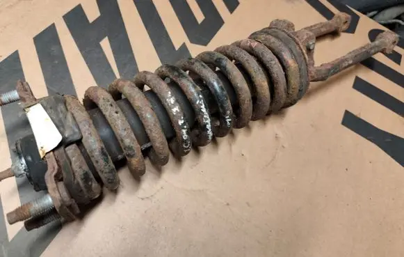 Jeep Cherokee III KJ Front shock absorber with coil spring