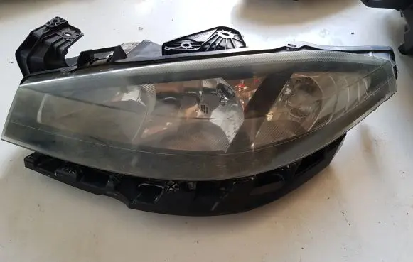 Renault Laguna II Headlight/headlamp 89900470