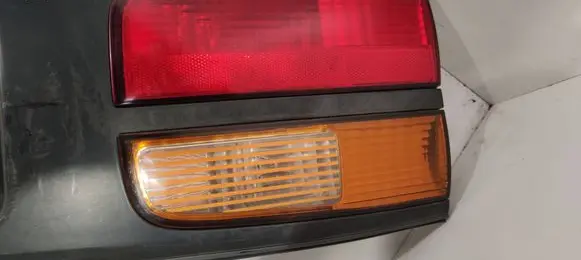 Renault Laguna I Trunk door license plate light bar 7700420119
