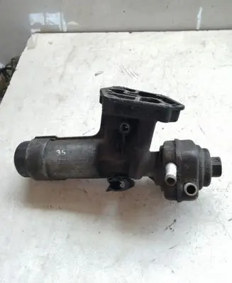 Volkswagen Golf IV Oil filter mounting bracket 038115389B