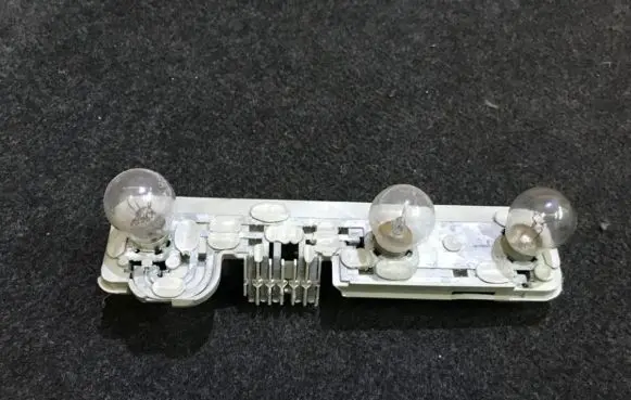 Opel Kadett E Tail light bulb cover holder